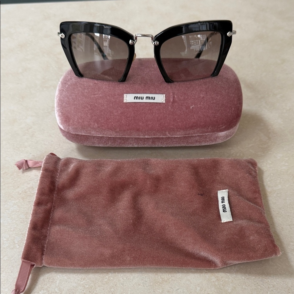 Miu Miu Glossy Black Sunglasses bought in Italy for 350. Euro Offers welcome!